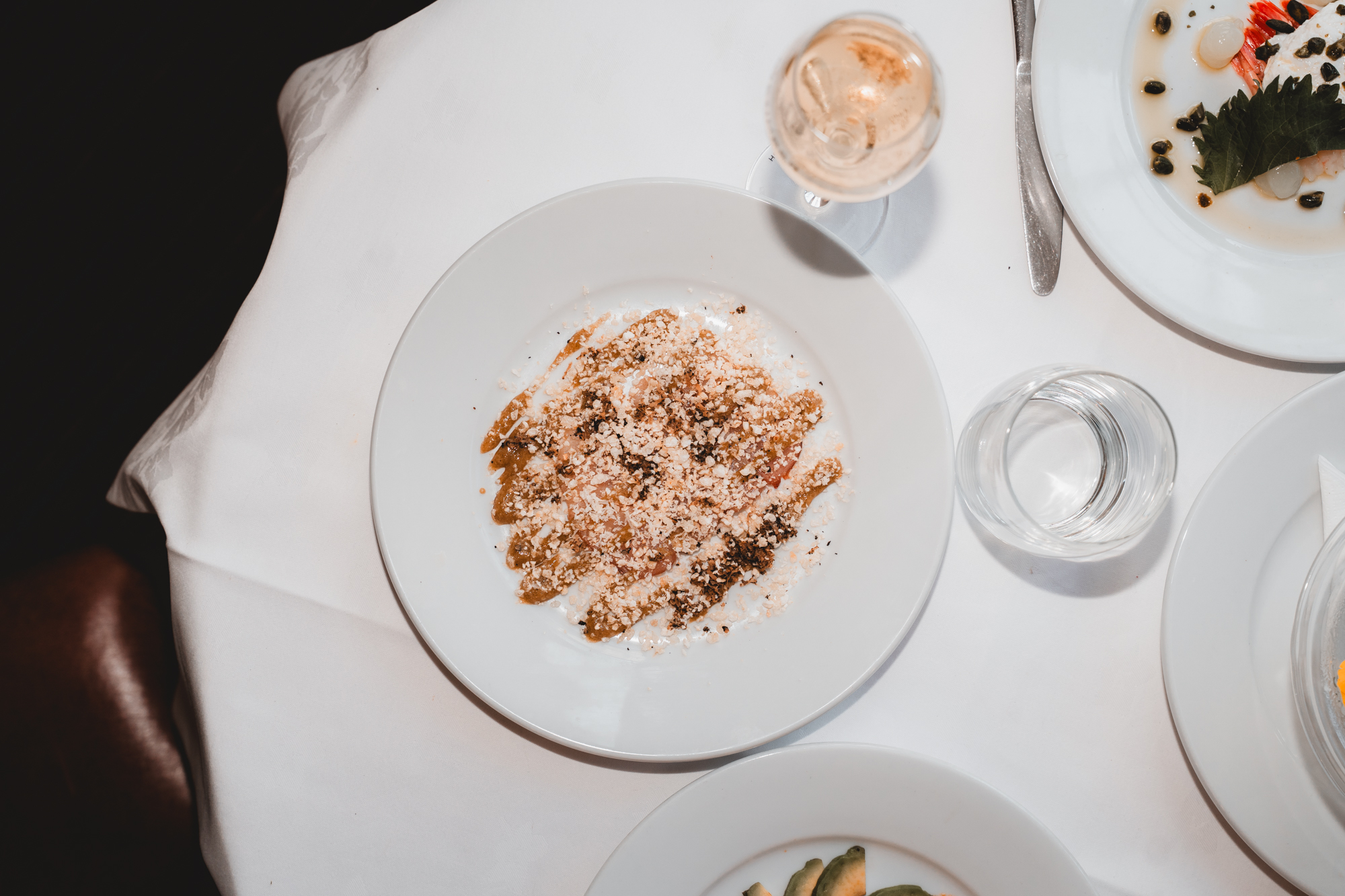 Salmon tartare, smoked crème fraîche, crispy capers, pumpernickel soil